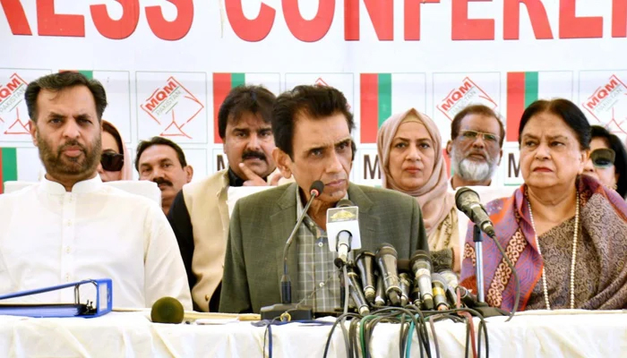 MQM-Pakistans Convener Khalid Maqbool Siddiqui (centre), flanked by party leaders Mustafa Kamal (left) and Nasreen Jalil (right), speaks during a press conference in Karachi on July 17, 2023. — X/@MQMPKOfficial