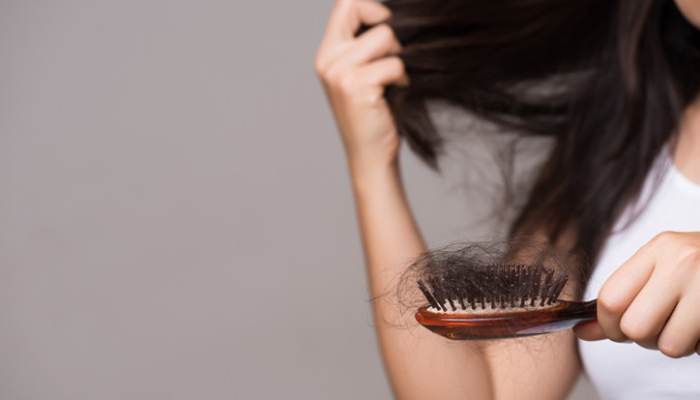 Unveiling 10 home remedies to combat hair fall