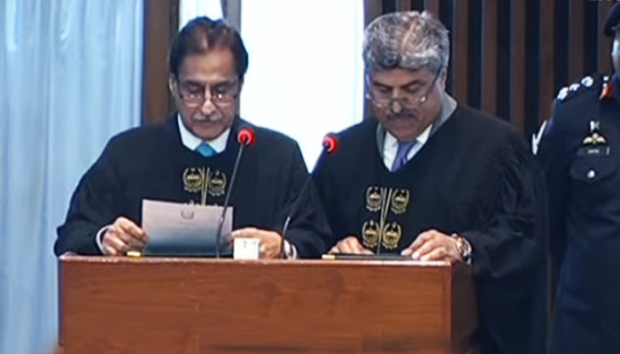 NA Speaker Ayaz Sadiq (left) administers oath to NAs newly elected Deputy Speaker Syed Ghulam Mustafa Shah in the lower houses session in Islamabad, on March 1, 2024, in this still taken from a video. — YouTube/@PTVParliament