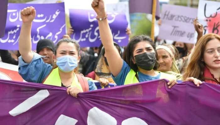 Aurat March protesters hold placards and shout slogans as they gather to mark International Womens Day in Islamabad — AFP/File