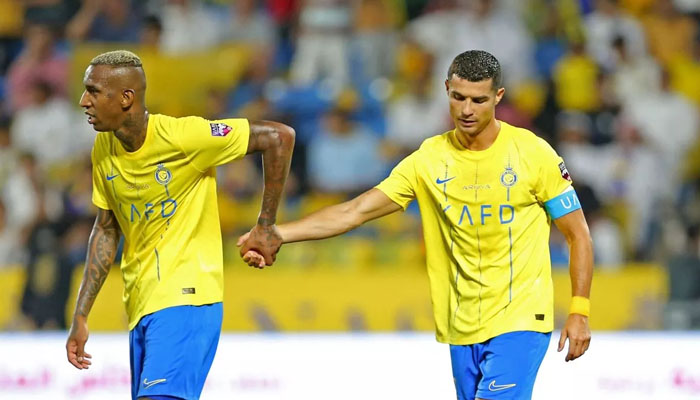 Cristiano Ronaldo and Anderson Talisca spotted together during a game. — AFP/File