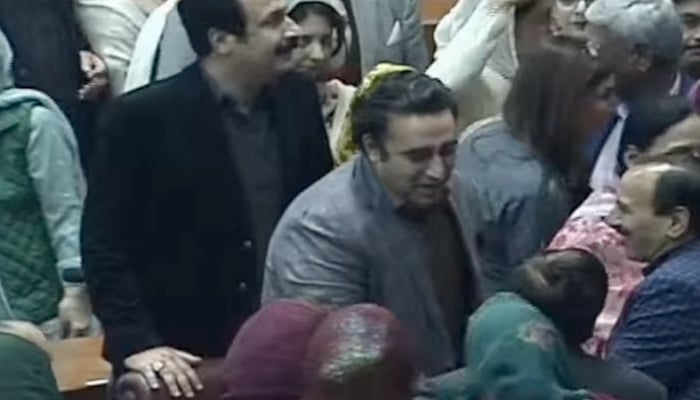 Parliamentarians congratulate PPP Chairman Bilawal Bhutto-Zardari after his father, Asif Ali Zardari, gets elected as the president in the National Assembly, on March 9, 2024, in this still taken from a video. — PTV