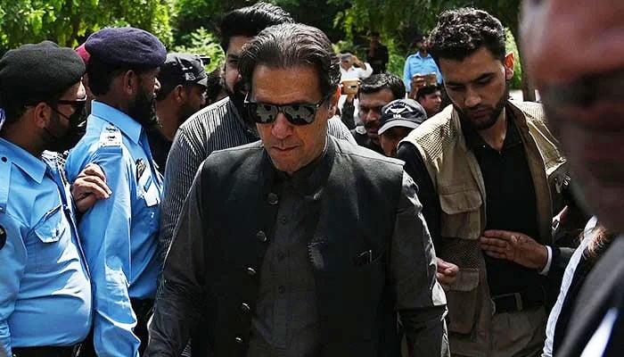 PTI founder Imran Khan (C) arrives to appear before the Anti-Terrorism Court in Islamabad on September 1, 2022. — AFP