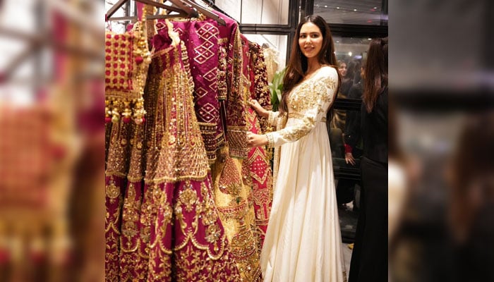 Bollywood actress Sonam Bajwa poses with MNR studio's collection. — Reporter