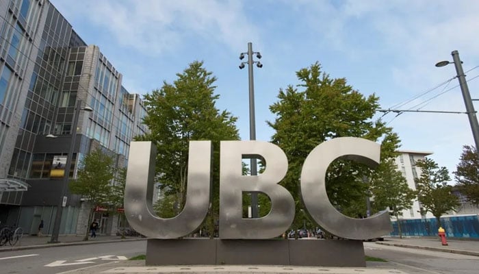 UBC ground sign in the campus of the University of British Columbia, Vancouver, BC, Canada – July 9, 2023. — University of British Columbia website
