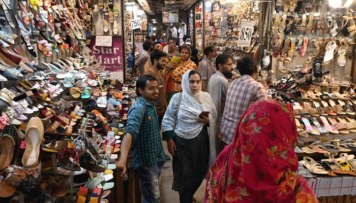People walk through a shopping centre in Pakistan in this undated image. — AFP/File