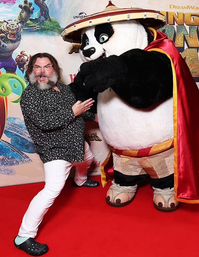 Jack Black strike several poses with Master Ping Xiao Po at the Australian premiere