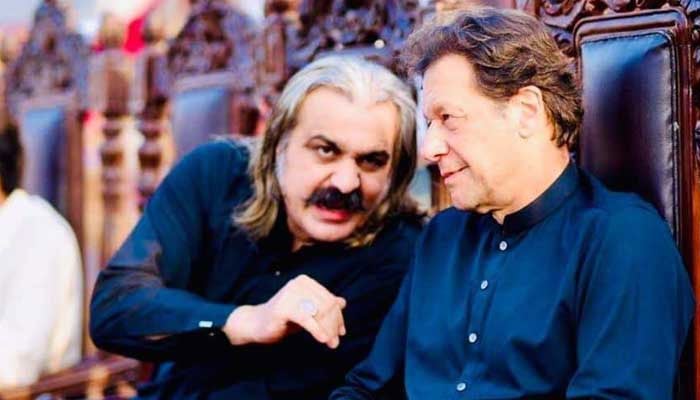 Khyber Pakhtunkhwa Chief Minister Ali Amin Gandapur (left) meets PTI founder Imran Khan in Adiala Jail on March 16, 2024.  — APP/file