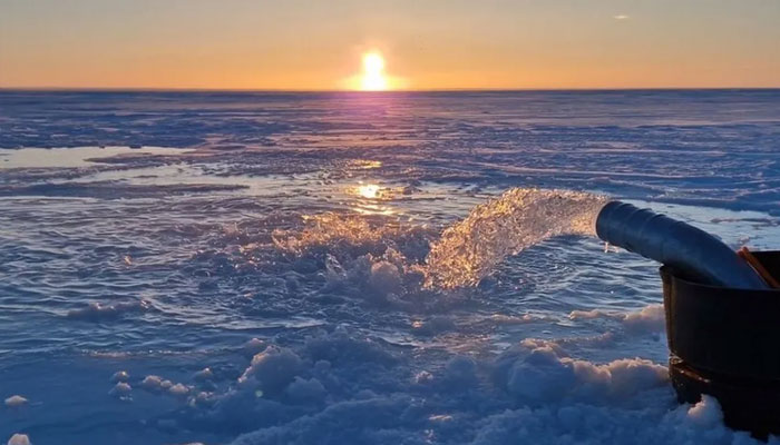 A pump is used to flood the sea-ice surface with seawater, which will then freeze.—Real Ice