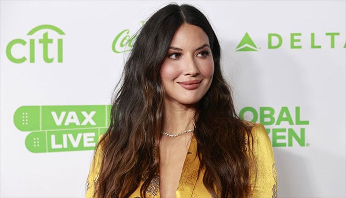 Olivia Munn faces breast cancer diagnosis and four surgeries.