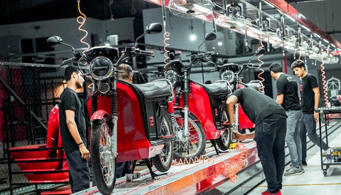 Employees of Zyp Technologies are working at an electric bike assembling unit facility in Lahore. — Zyp Technologies/File
