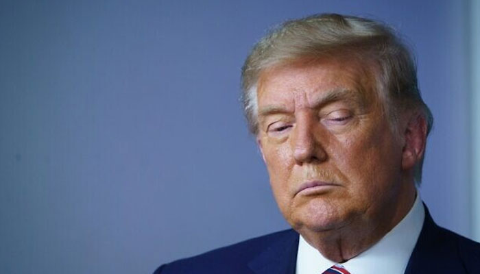 Expert warns Donald Trump could file for bankruptcy over $464 million debt. — AFP