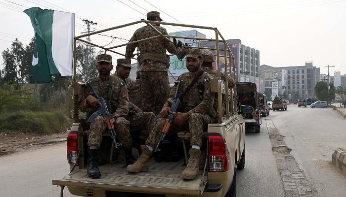 Pakistan Army and security officials are holding a flag march to develop a sense of protection among the masses and maintain law and order situation ahead of the General Elections 2024 in Hyderabad on February 6, 2024. —INP