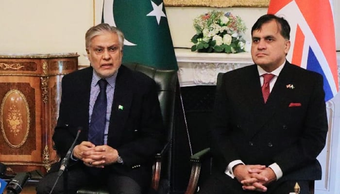 Foreign Minister Ishaq Dar (left) addressing a press conference at Pakistan High Commission in London on March 23, 2024. — PID