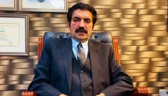 PTI leader and MNA Sher Afzal Marwat is seen seated in his office in this still taken from a video. — X/@sherafzalmarwat