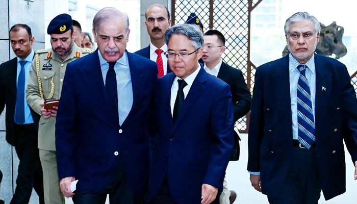 Prime Minister Shehbaz Sharif visits the Chinese embassy in Islamabad and met with Chinese ambassador Jiang Zaidong to offer condolences over the death of Chinese nationals in suicide attack in district Shangla on March 26, 2024. — PID