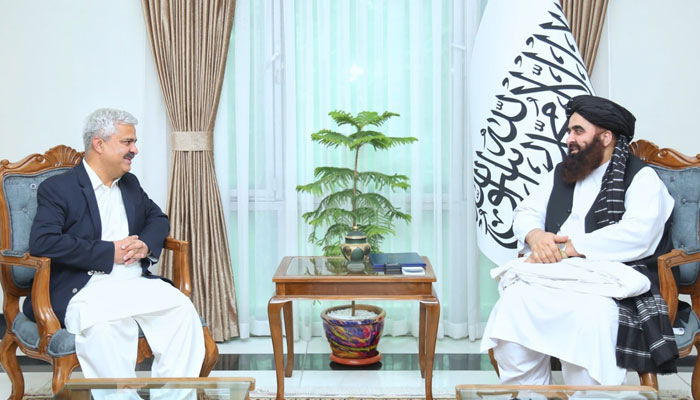 Commerce Secretary Khurram Agha (left) in talks with Afghanistans Foreign Minister Amir Khan Muttaqi, — X/@Pak_AfgAffairs