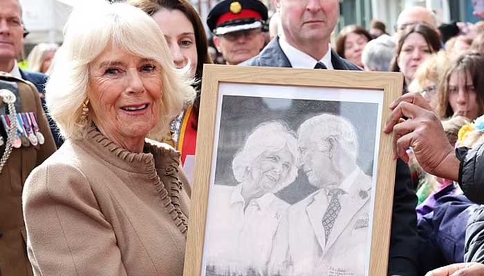 Queen Camilla receives stunning gift as she visits farmers market in Shrewsbury