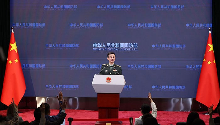 China’s Ministry of National Defence spokesperson Colonel Wu Qian addresses a press conference on October 26, 2023. — Chinas Defense Ministry