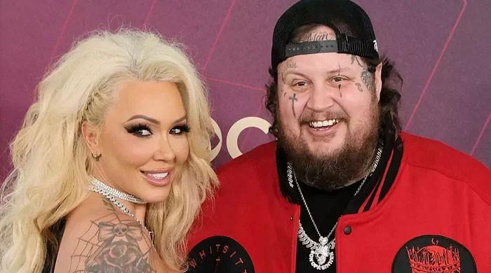Jelly Roll dances with wife