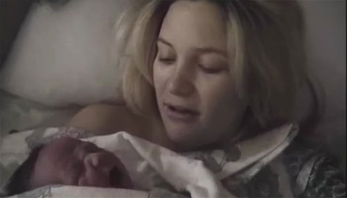 Kate Hudson reveals intimate moments with son Ryder in music video.