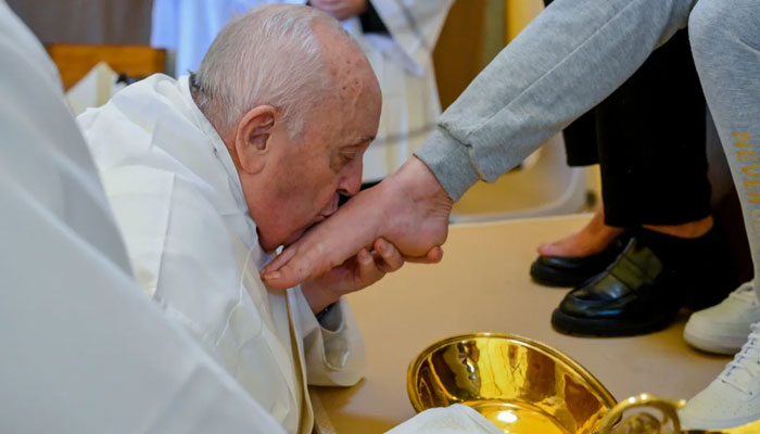 Pope Francis performs humble foot-washing ceremony at Romes Rebibbia prison. — Vatican Media