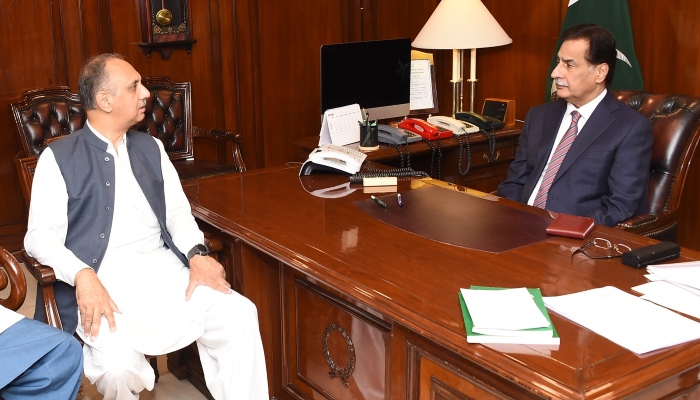 Leader of the Opposition in National Assembly Omar Ayub (left) and NA Speaker Ayaz Sadiq (right) are discussing nomination of opposition leader at the speakers office in Islamabad on April 2, 2024. —X/@NAofPakistan