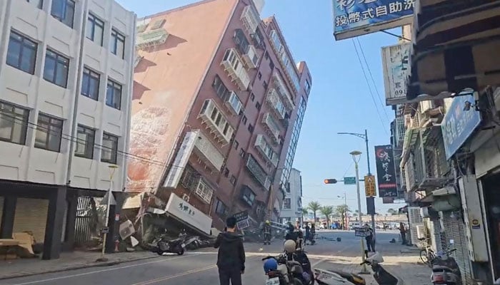 In this image captured in a video clip broadcast by TVBS, a partially collapsed building is seen in Hualien City, eastern Taiwan, Wednesday, April 3.