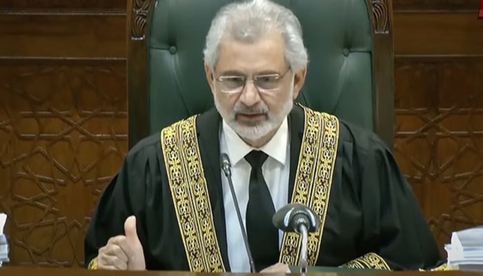 CJP Qazi Faez Isa announcing verdict on petitions against Supreme Court (Practice and Procedure) Act 2023, on October 11, 2023, in this still taken from a video. — PTV News