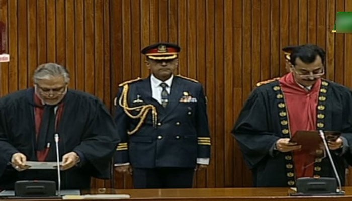 Senator Ishaq Dar administers oath to newly-elected Senate Chairman Syed Yusuf Raza Gilani. — YouTube screengrab