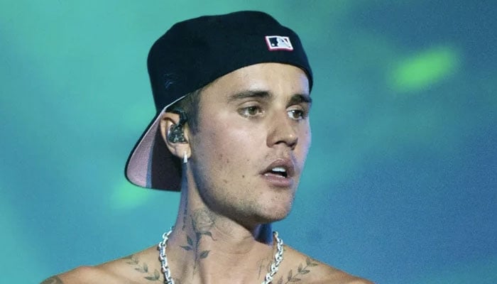 Justin Bieber keeps low profile at Coachella Festival amidst wife Haileys absence.