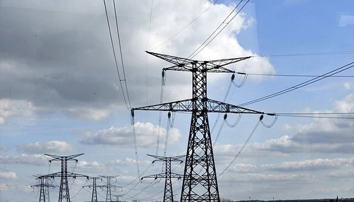 A representational image of pylons and power lines. — AFP/File