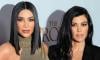 Kourtney Kardashian turns Kim's famous words into a cake topper