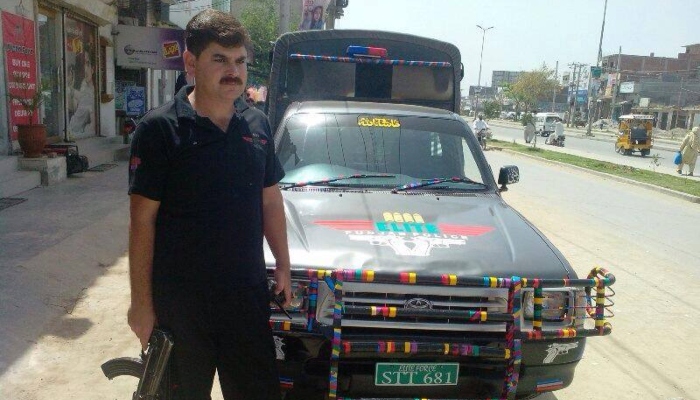 An official of Elite Police is standing guard at a site in Sargodha district. — Facebook/Elite Police Force Punjab