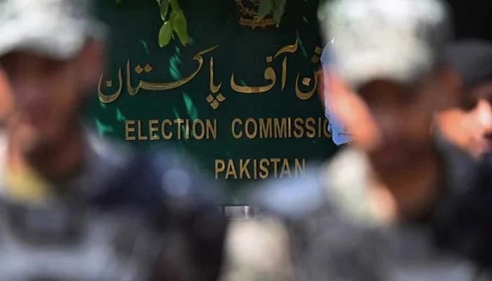 Security personnel stand guard outside Election Commission of Pakistan building in Islamabad. — AFP/File