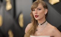 Taylor Swift Hints She’s Bringing ‘Tortured Poet’s Department To ‘Eras Tour’