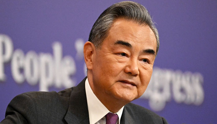 Politics tamfitronics Chinese language International Minister Wang Yi appears on while speaking at a news convention in Beijing. — AFP/File