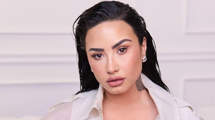 Demi Lovato shows hairdo latest l_1182852_024313_upd