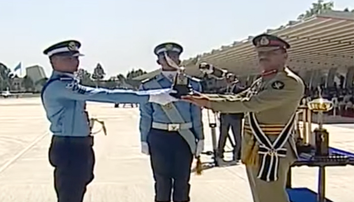 Chief of Army Staff General Asim Munir presents a shield to a cadet at the Pakistan Air Forces passing out parade at the Asghar Khan Academy in Risalpur, Khyber Pakhtunkhwa on May 2, 2024, in this still taken from a video. — YouTube/PTV News Live