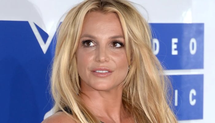 Britney Spears reveals ankle injury
