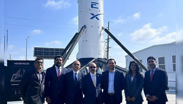 Pakistans Ambassador to the US Masood Khan (centre) poses for a photo during his visit at SpaceXs headquarters in California on May 3, 2024. — X/@Masood__Khan