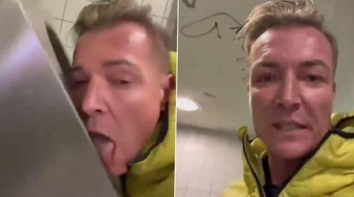 German politician's video of licking public toilets goes viral