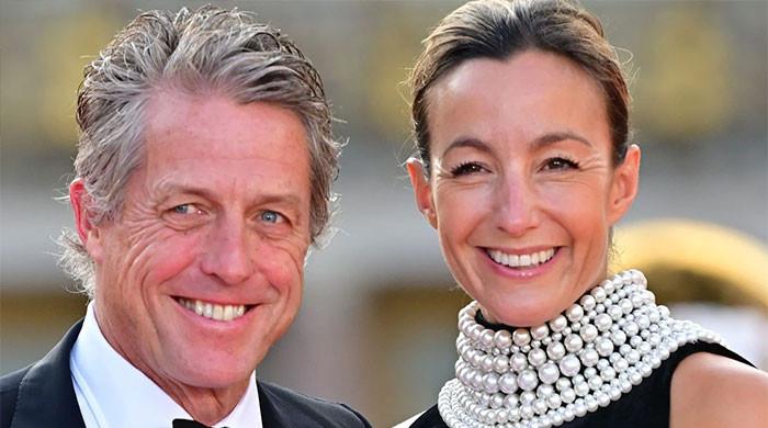 Hugh Grant and wife Anna Eberstein attend Formula One Grand Prix in Italy