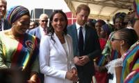Prince Harry Plays Side Role In 'The Meghan Show' On Nigeria Trip