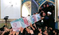 Iran's Raisi Buried In Mashhad As Mourners Pack Iranian Holy City