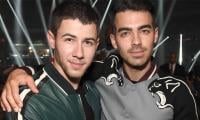Nick, Joe Jonas Turn Cannes AmfAR Gala Into Surprise Jonas Brothers Show