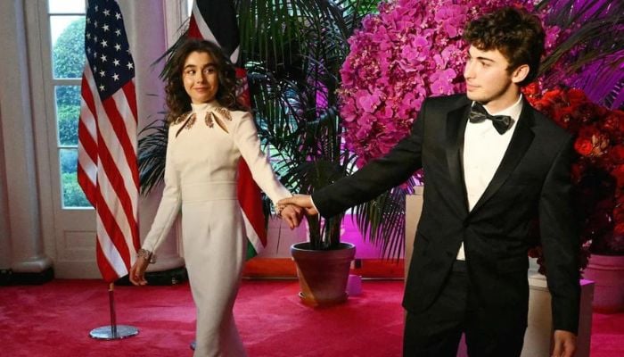 Natalie Biden walks hand in hand with new British boyfriend. — AFP/File