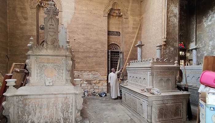 A man stands inside the tomb of the El-Meligy family, prior to its demolition in a historic Cairo cemetery, on November 6, 2024. — AFP