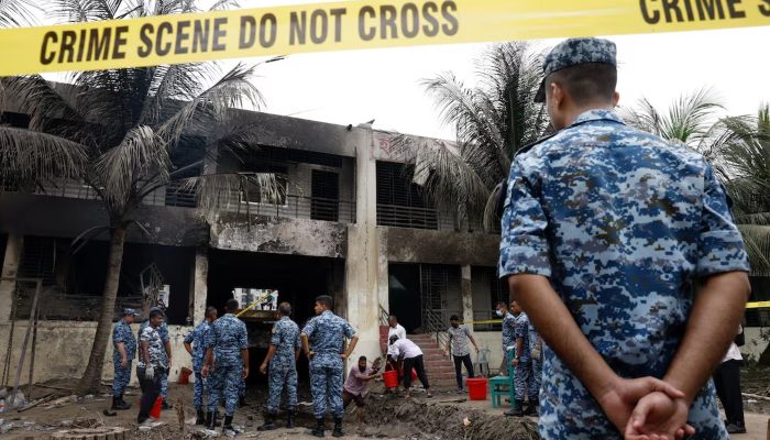 Members of Bangladesh Airforce investigate on the site, after an air force training aircraft crashed into a building belong to Milestone School and College campus, in Dhaka, Bangladesh, July 22, 2025. — Reuters