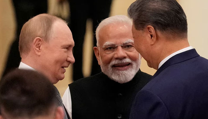 Indian Prime Minister Narendra Modi talks with Russian President Vladimir Putin and Chinese President Xi Jinping ahead of the Shanghai Cooperation Organization (SCO) Summit 2025 at the Meijiang Convention and Exhibition Centre in Tianjin, China, September 1, 2025. — Reuters